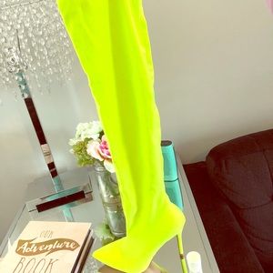 Neon yellow thigh high boots